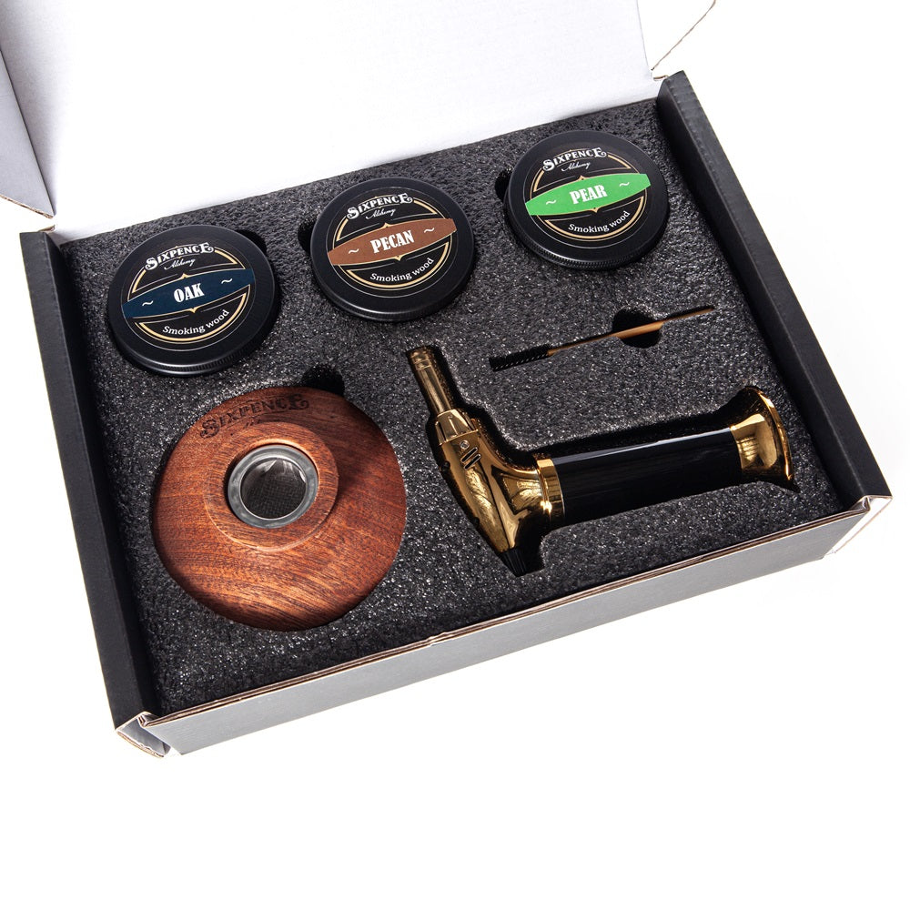 Cocktail smoking kit in gift box with 6 flavours of wood chip, butane torch, whiskey rocks and sustainably sourced hardwood smoke top